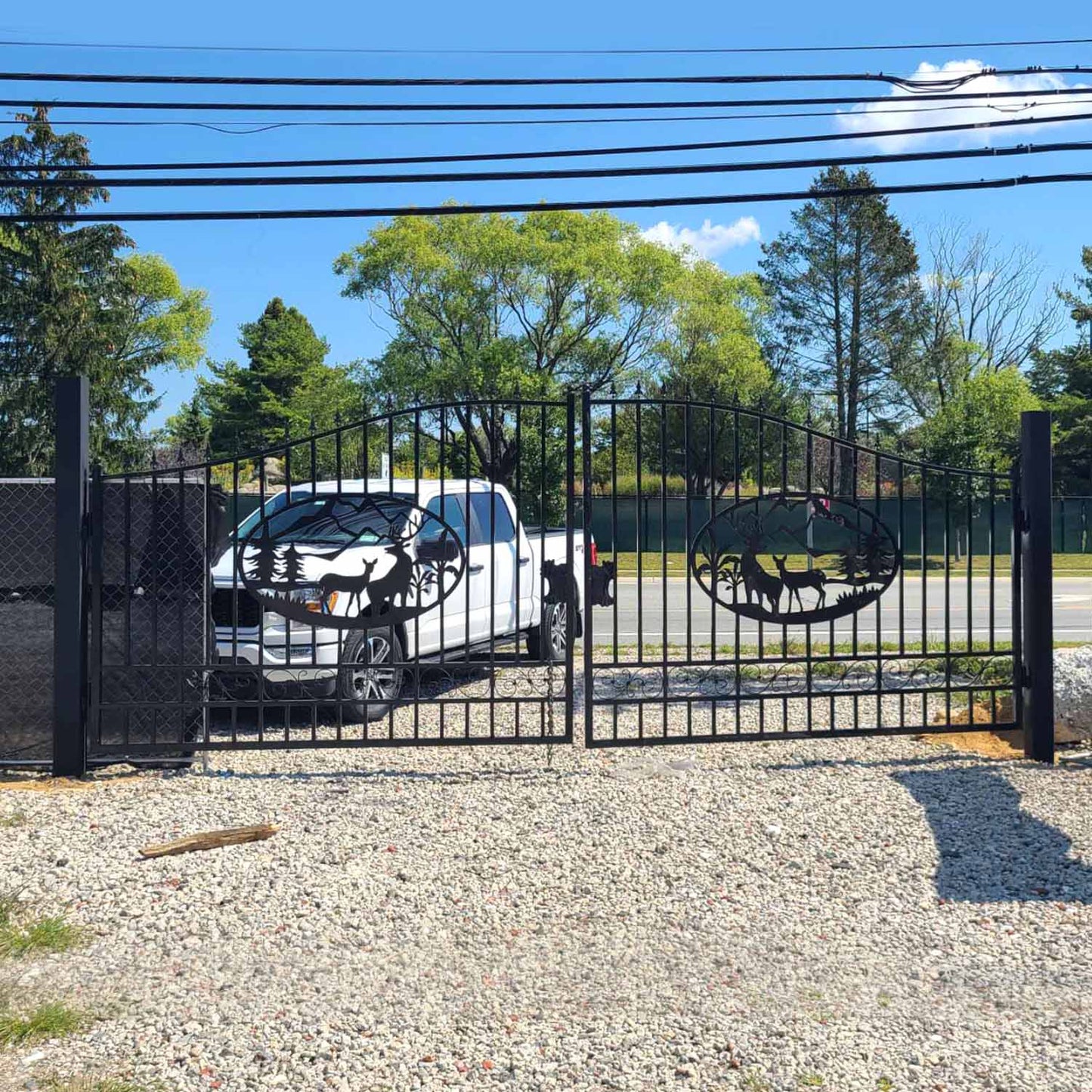 20x8 ft deer pattern steel dual swing driveway gate application