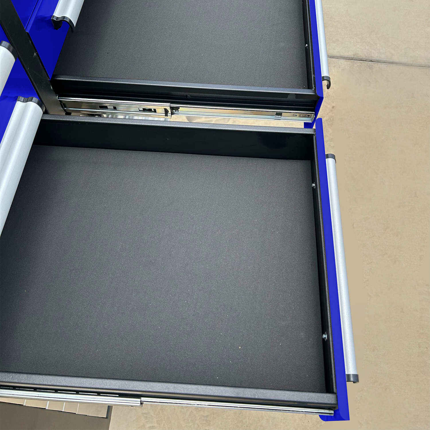 Each drawer for our 10' garage storage cabinet has an precut anti-slip drawer liner