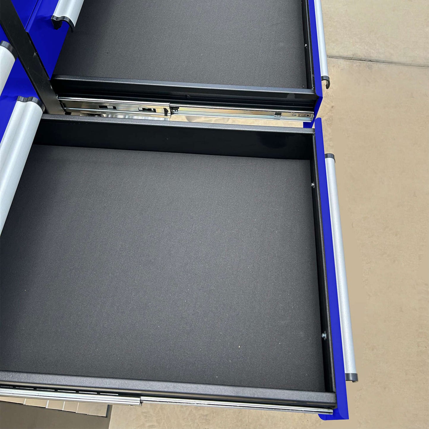 Each drawer for our 10' garage storage cabinet has an precut anti-slip drawer liner#color_blue