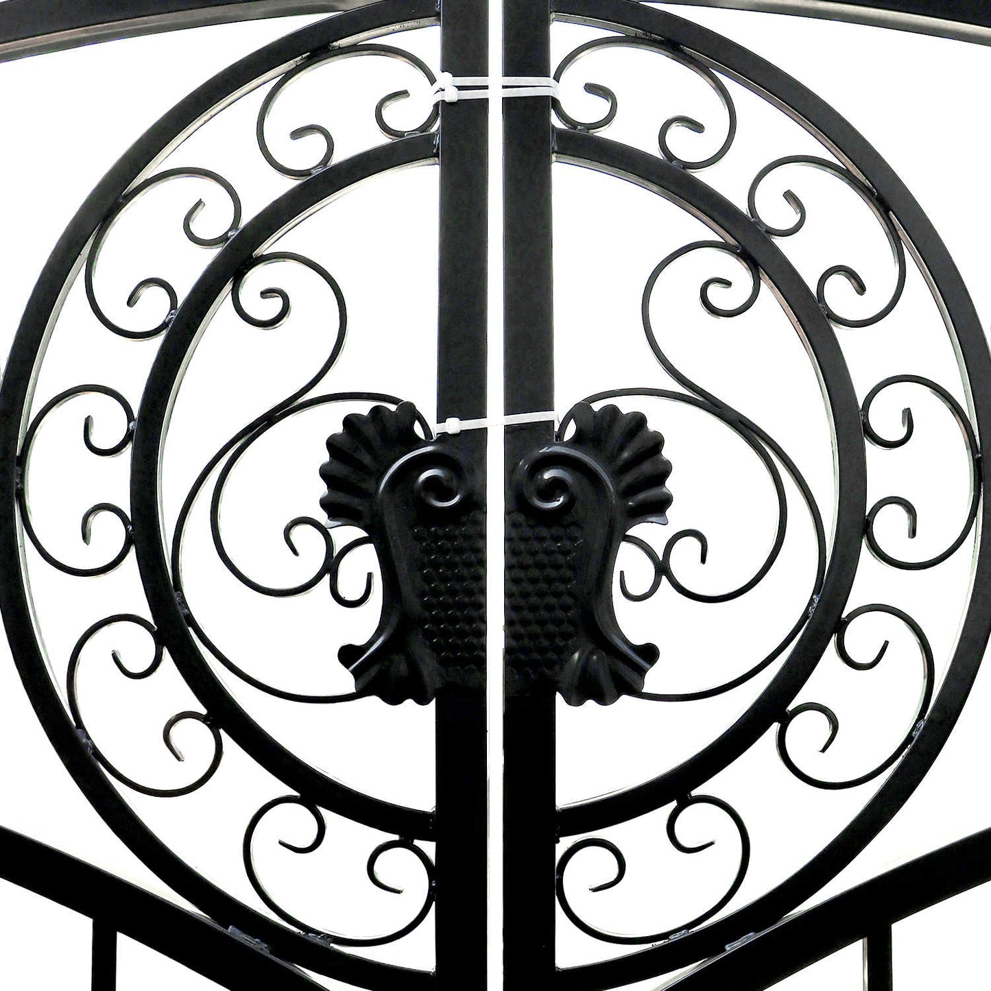 The 14 ft European style driveway gate features beautiful scrollwork and sturdy latches.