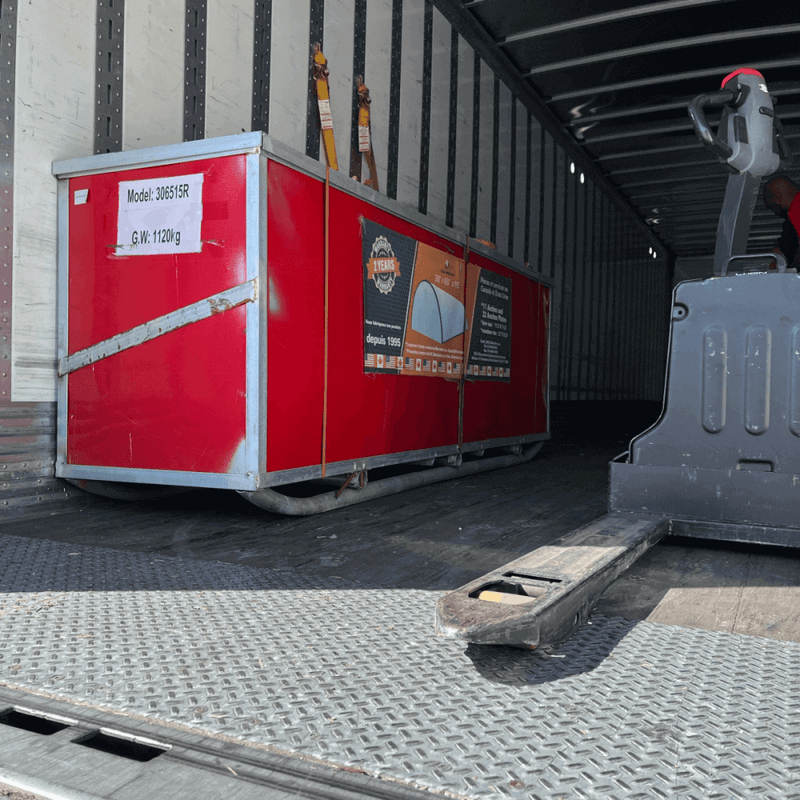 Single Truss Arch Storage Shelter W30'xL65'xH15' shipping truck