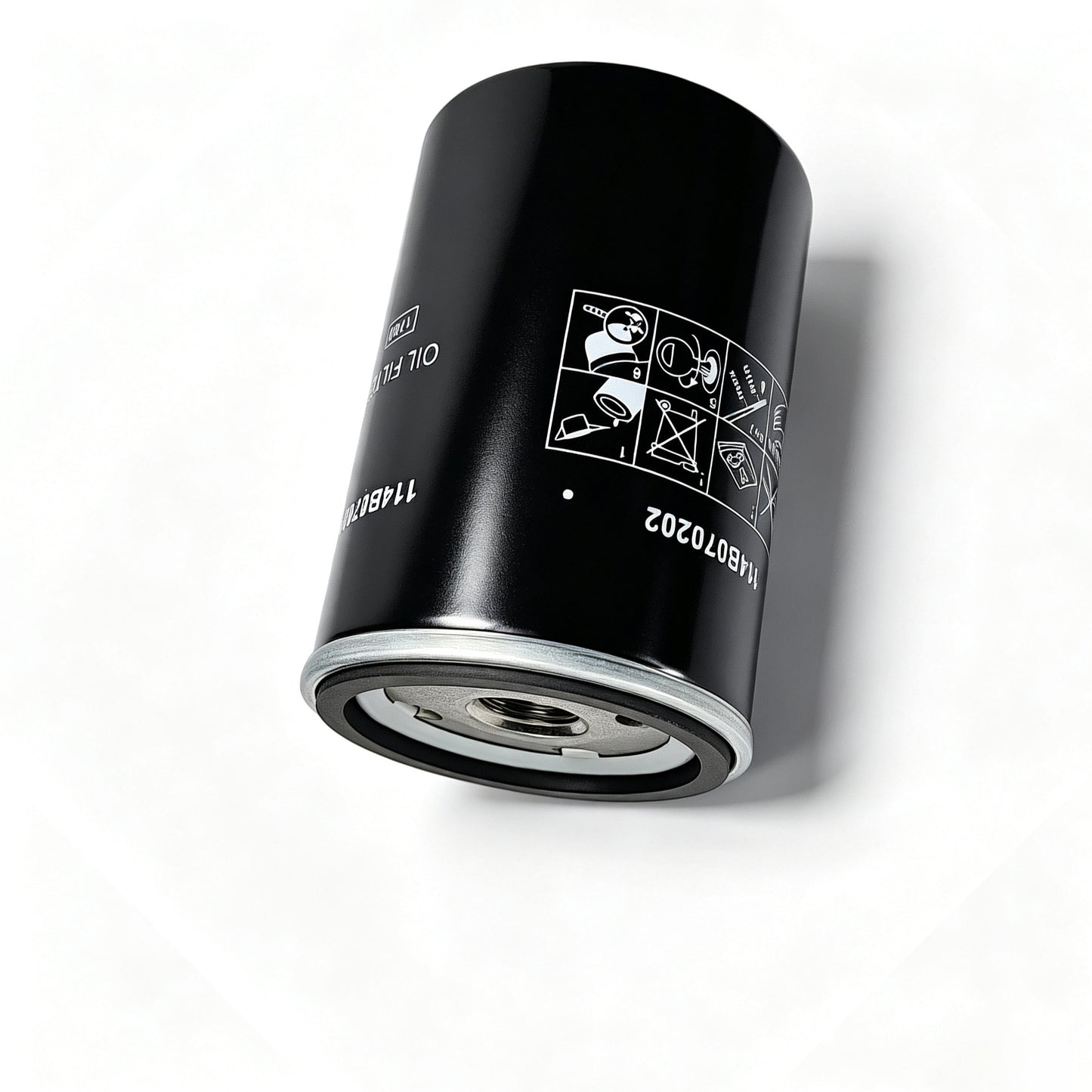 A black cylindrical automotive oil filter with a silver metal base
