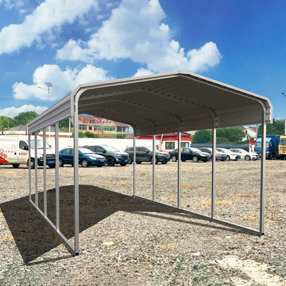 Metal carport structure in an outdoor setting with vehicles in the background