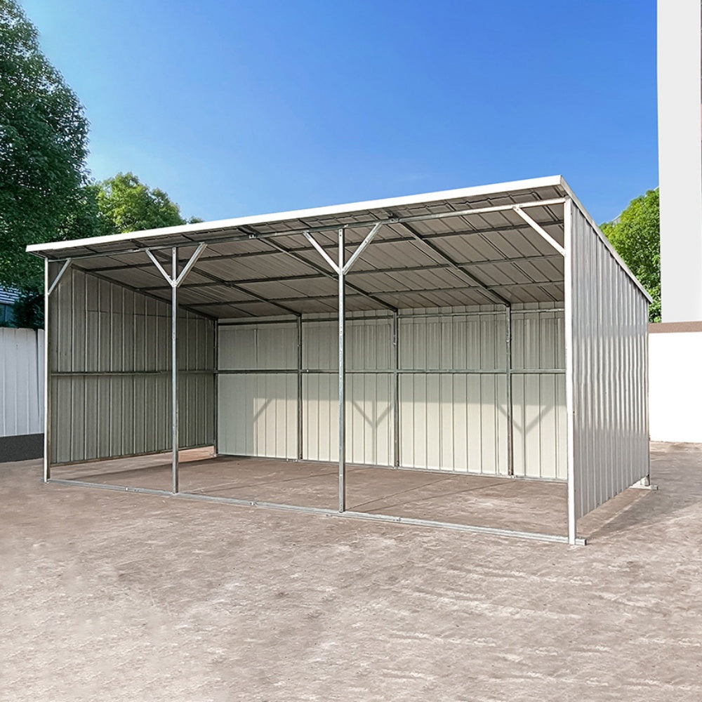 Metal carport structure with a clear blue sky background