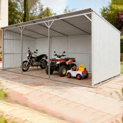 Metal carport with a motorcycle, ATV, and toy car inside on a sunny day.