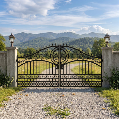 An ornate black wrought-iron double gate with decorative scrollwork