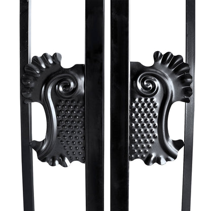 Close-up of decorative black metal handles