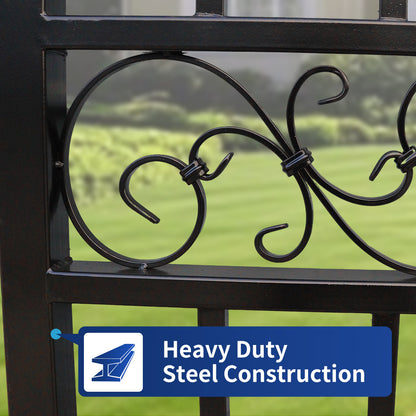 Close-up of a black wrought iron fence gate with decorative scrollwork