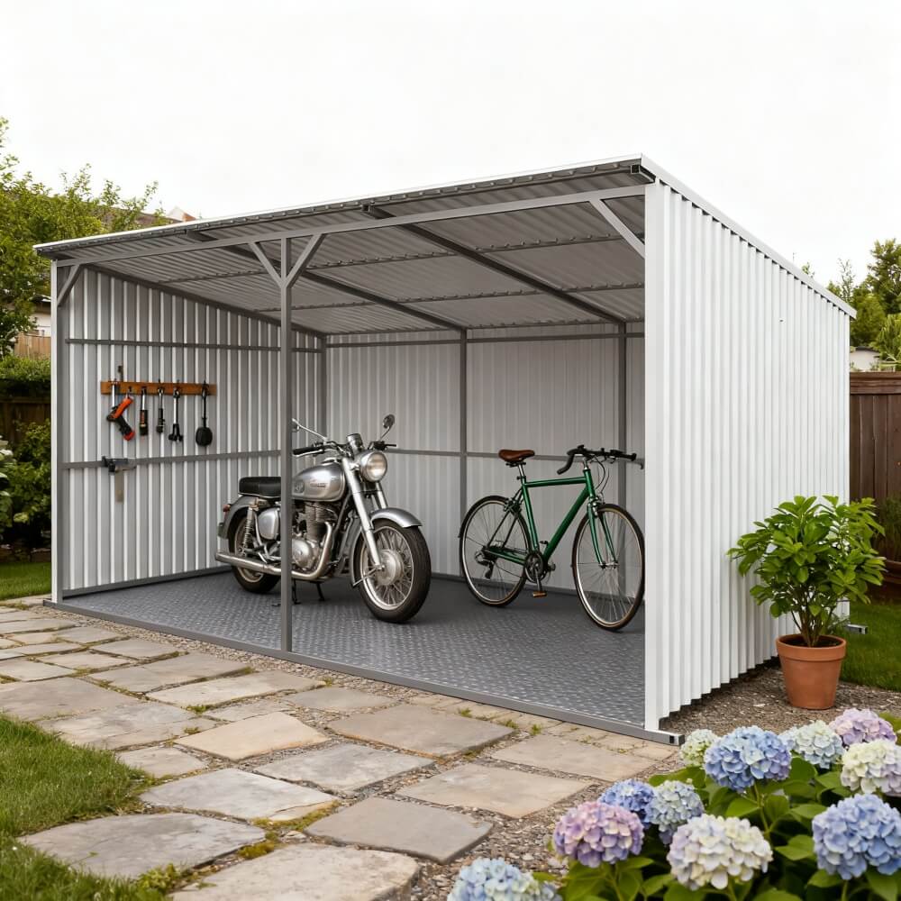Metal garden shed with motorcycle and bicycle inside, surrounded by flowers and a stone path.