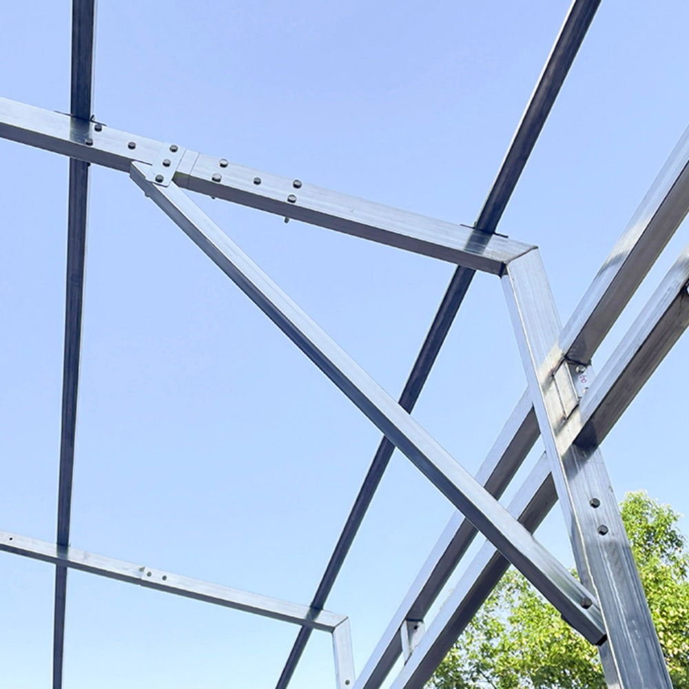 Metal frame structure against a clear blue sky
