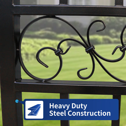 Close-up of a black wrought iron fence gate with decorative scrollwork