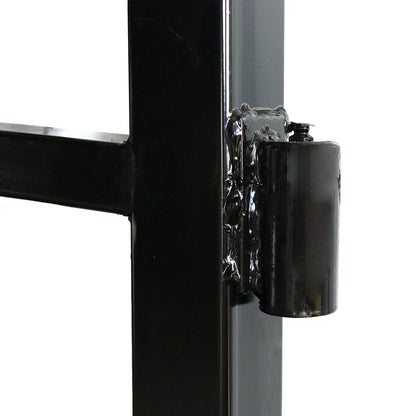 Close-up of a black metal hinge attached to a black metal frame
