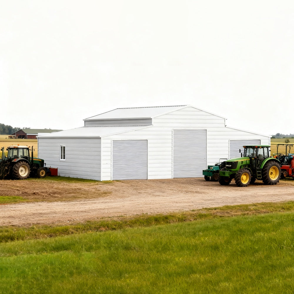 White agricultural building with tractors on a farm#color_White