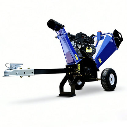 Blue and black wood chipper on a white background