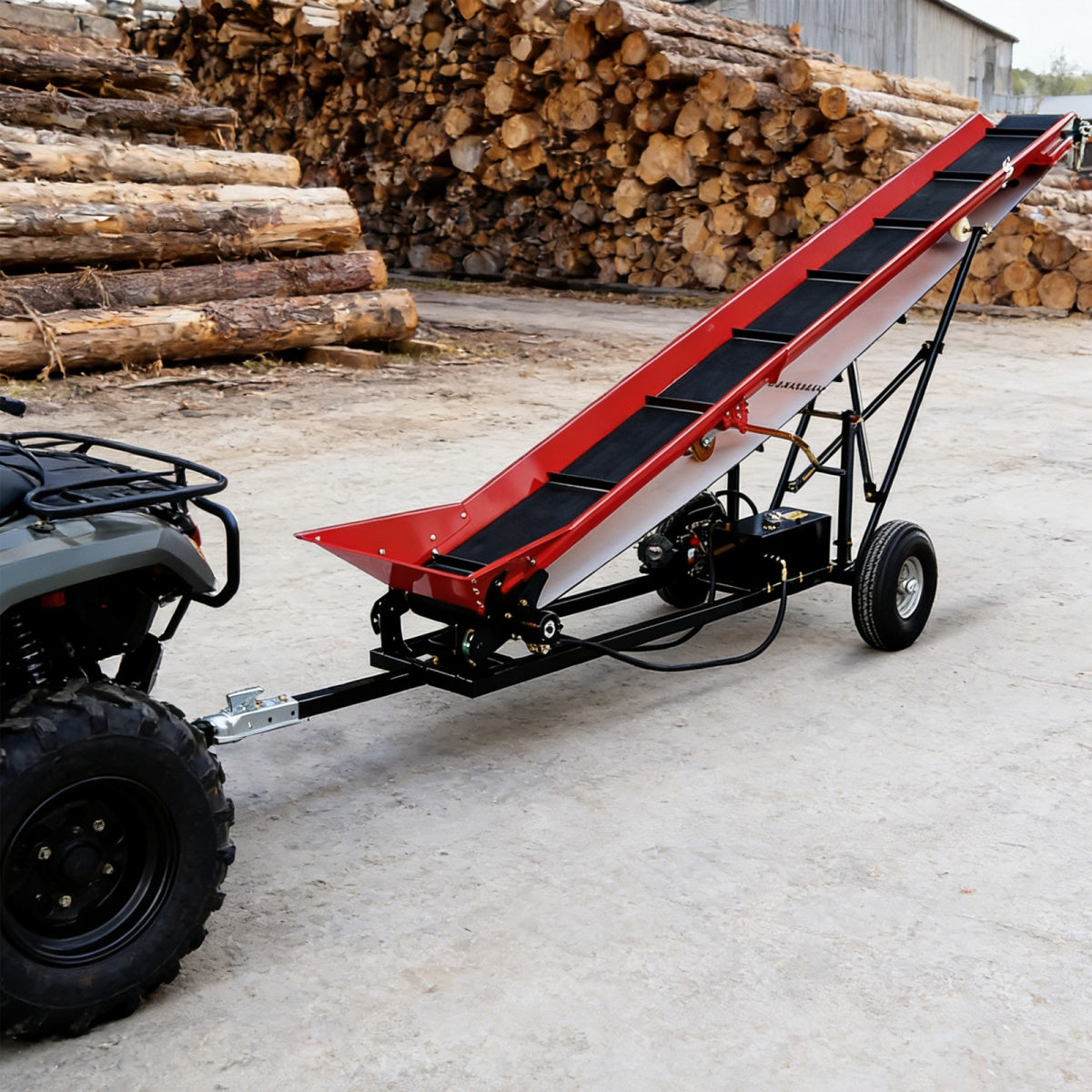 Firewood Conveyor belt system attached to an ATV in a logging area with stacked logs in the background.