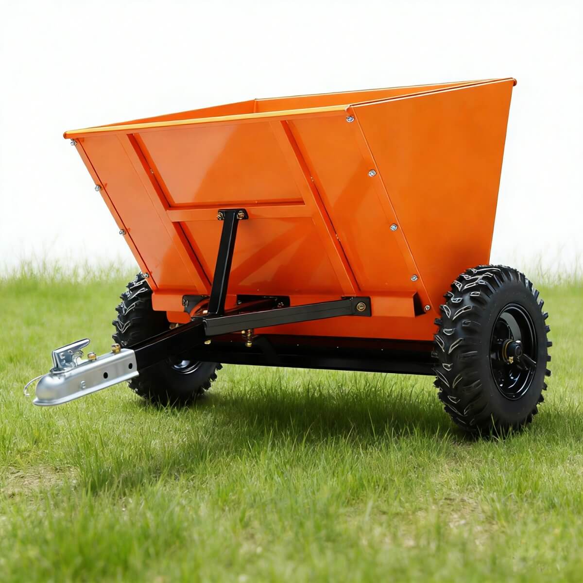Orange dump cart on grass with a white background