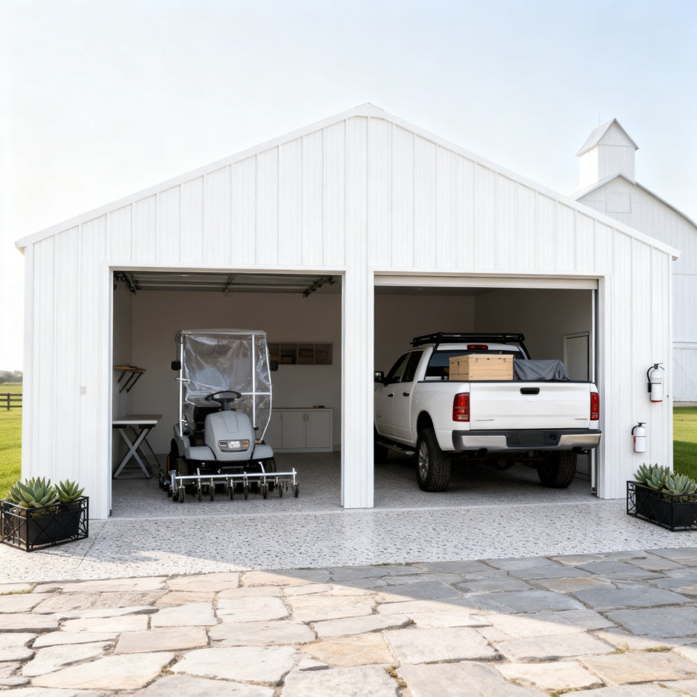 White two-car garage with a truck and golf cart inside, stone driveway leading to it.#color_White