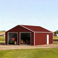 Red metal barn with open doors showing tractors on a clear day#color_Reddish Brown