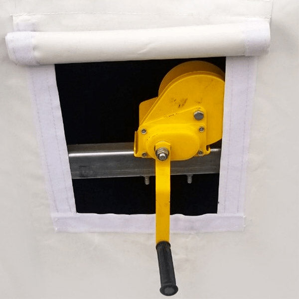 The storage shelter is equipped with hand winch roll up doors 