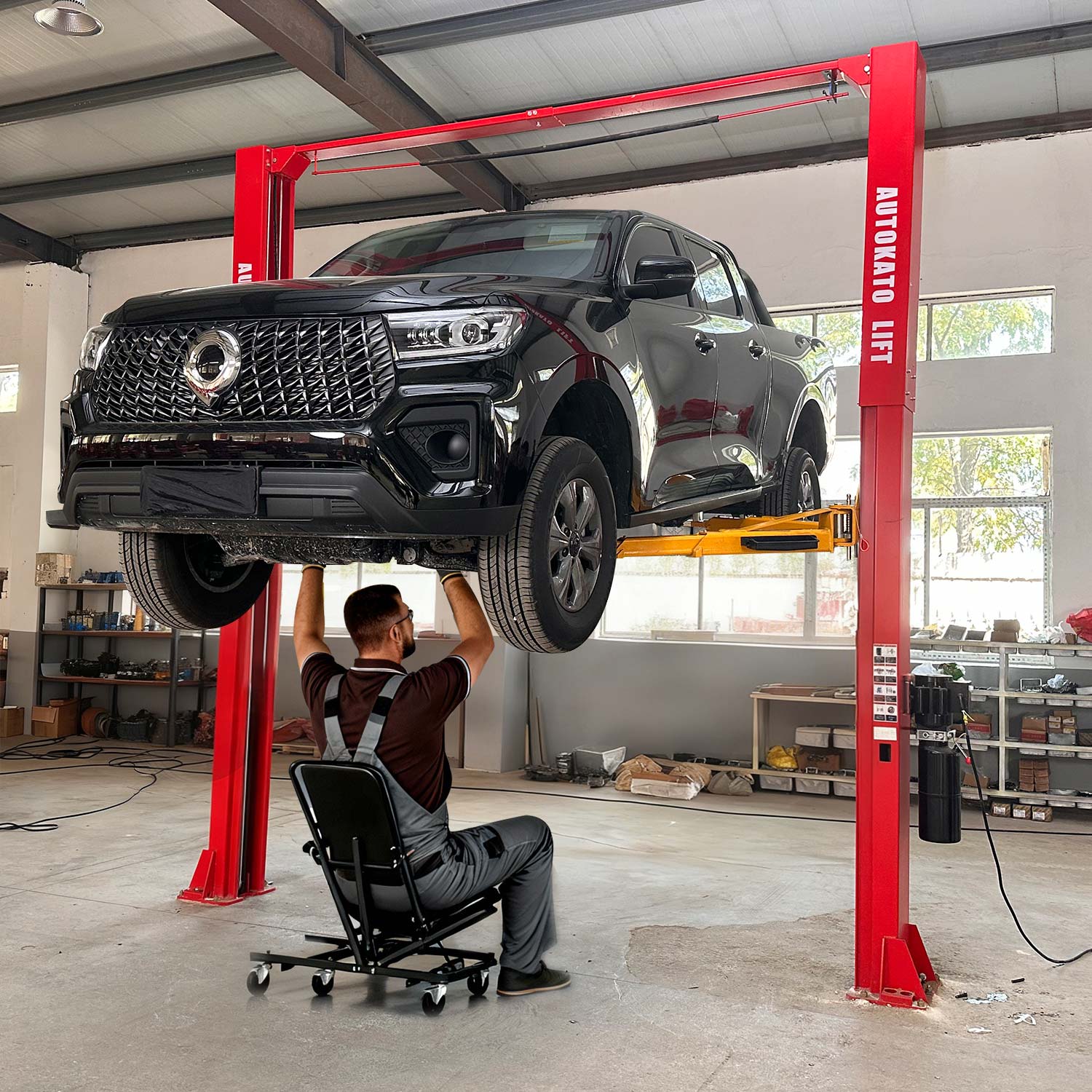 The KT-M120 car lift makes it easy to access undercar parts for vehicle repair and maintenance