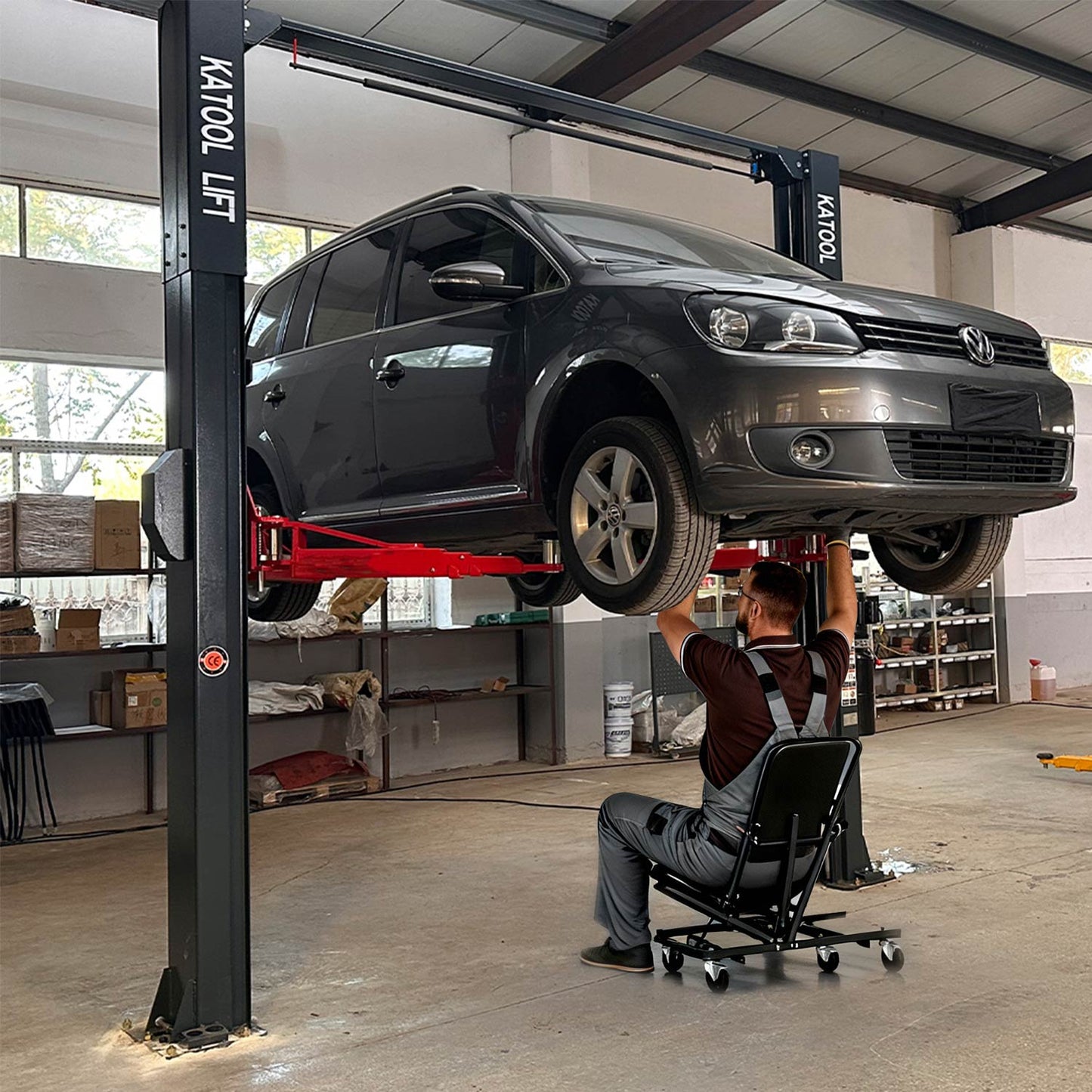 The car lift makes it easy to access undercar parts for vehicle repair and maintenance