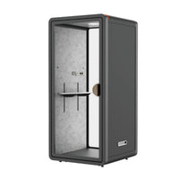 Small dark gray soundproof booth with transparent glass door on a white background#color_Black