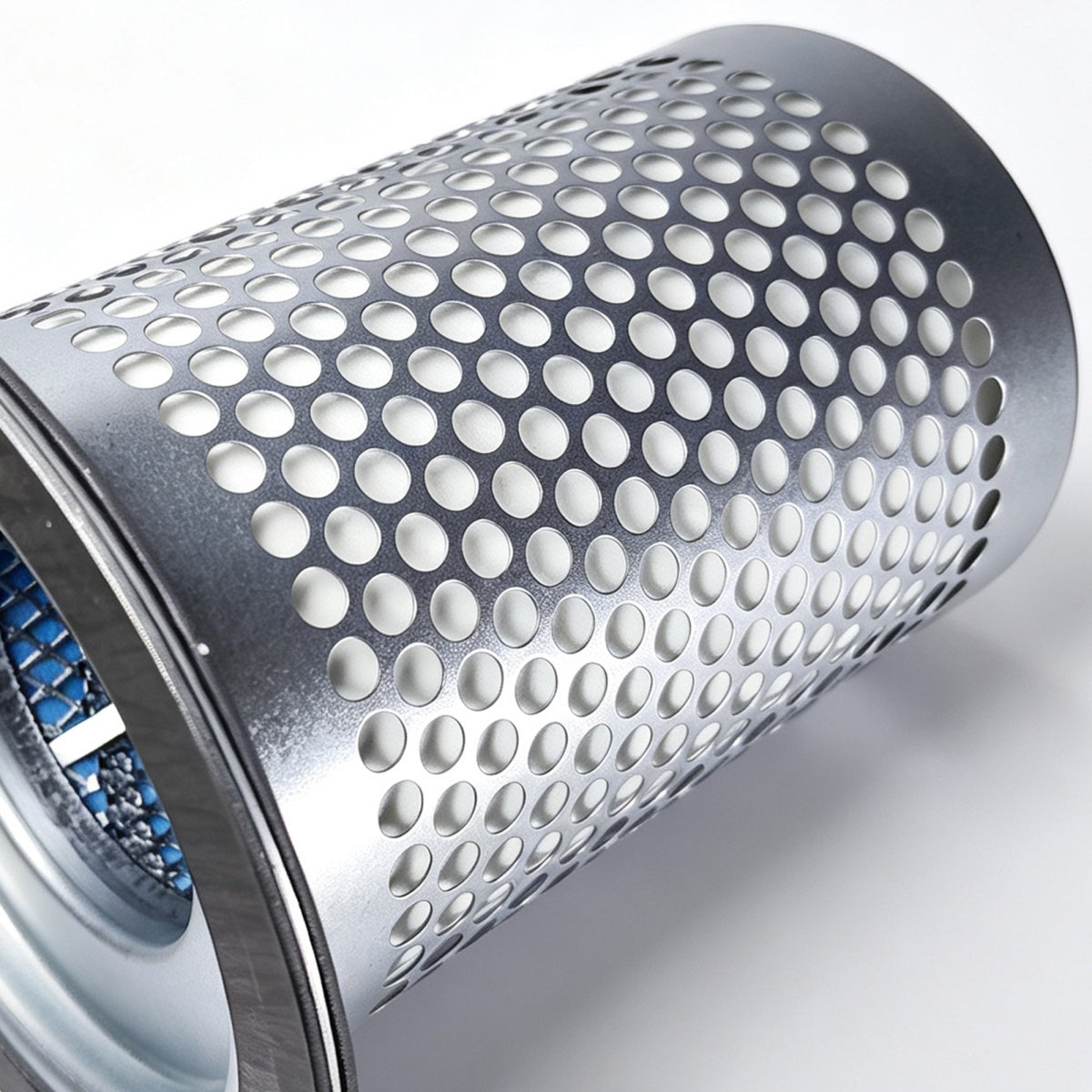 A close-up of a perforated metal cylindrical filter element