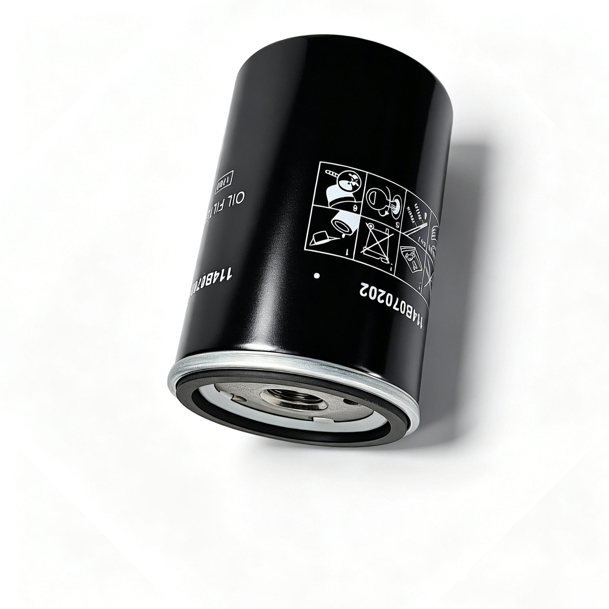 A black cylindrical automotive oil filter with a silver metal base