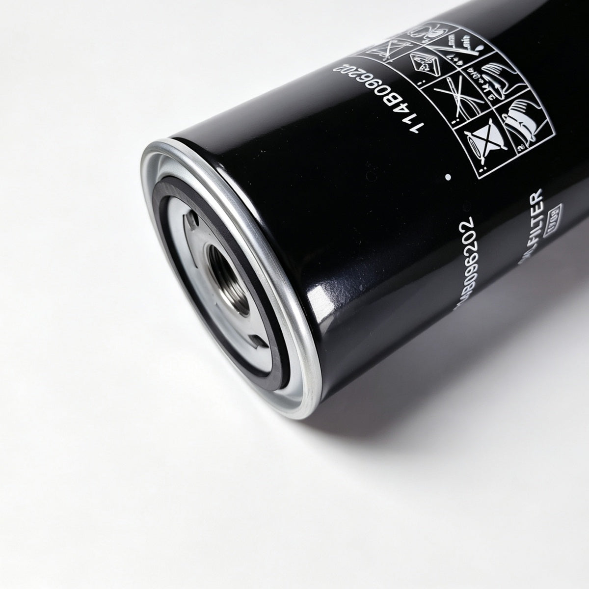 A close-up shot of a black cylindrical automotive oil filter