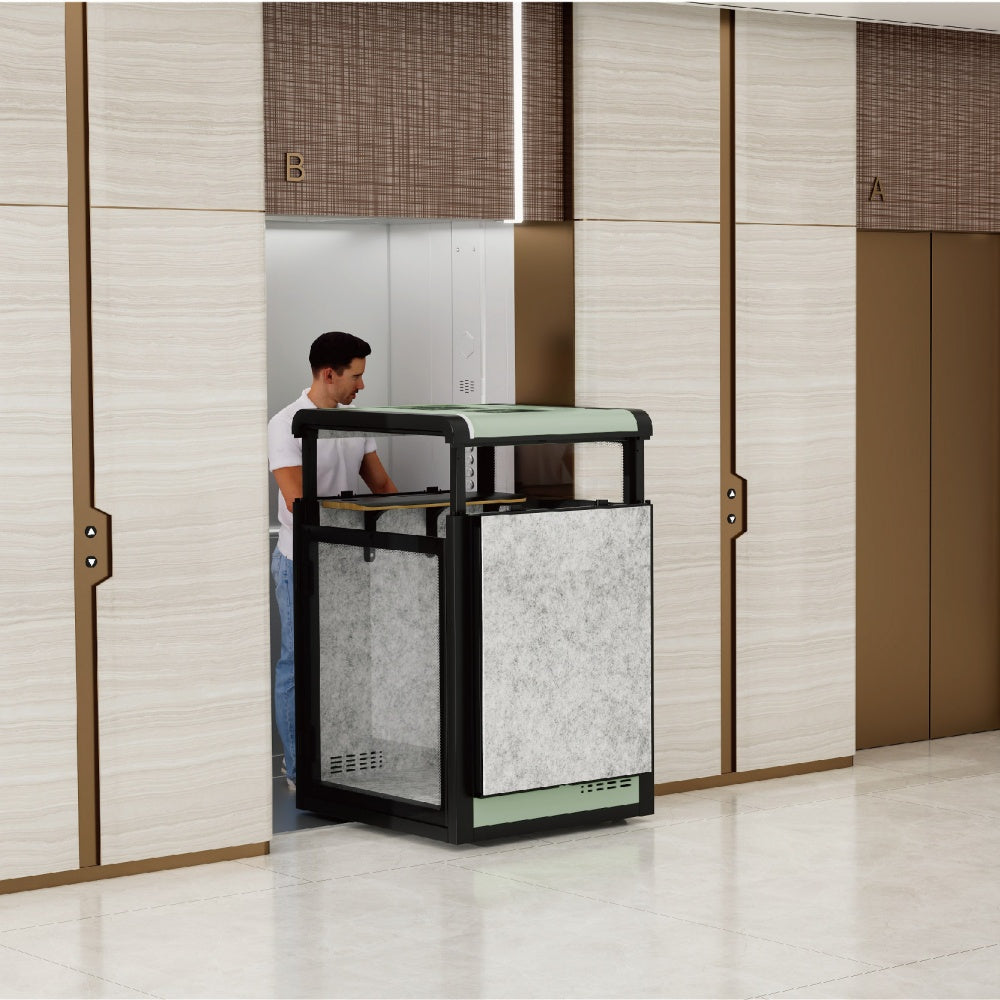 Person using a modern trash can in a well-lit room