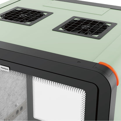 Pet carrier with mesh door and black grid vents on a light green background